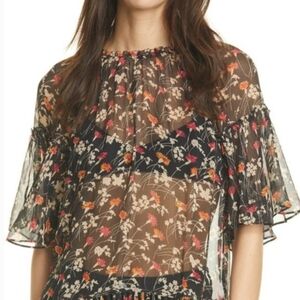 Joie "Imani" sheer blouse top. Short sleeves. 100% silk. Black. Flowers. Size S.
